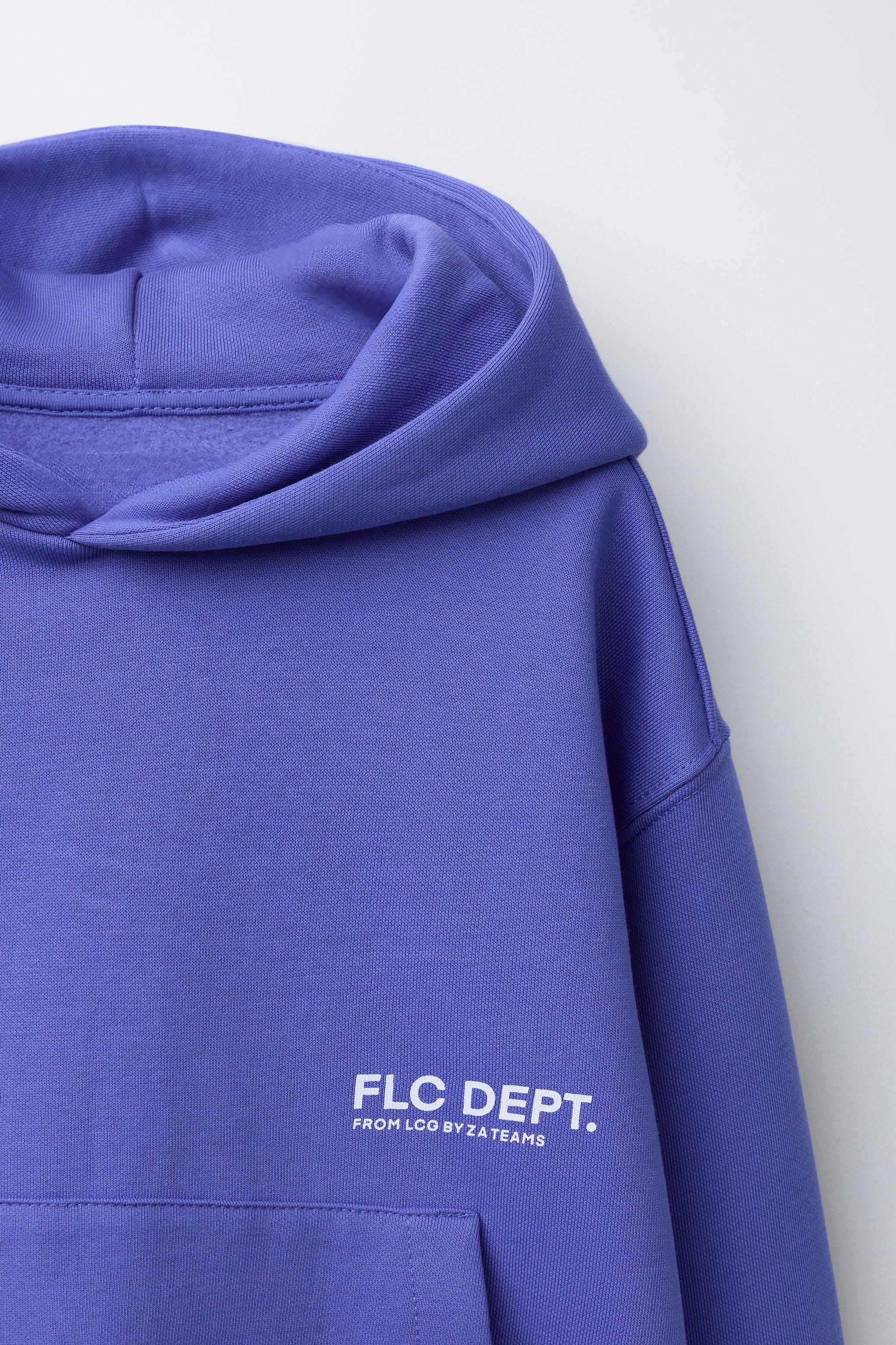 SWEAT À CAPUCHE AVEC INSCRIPTION